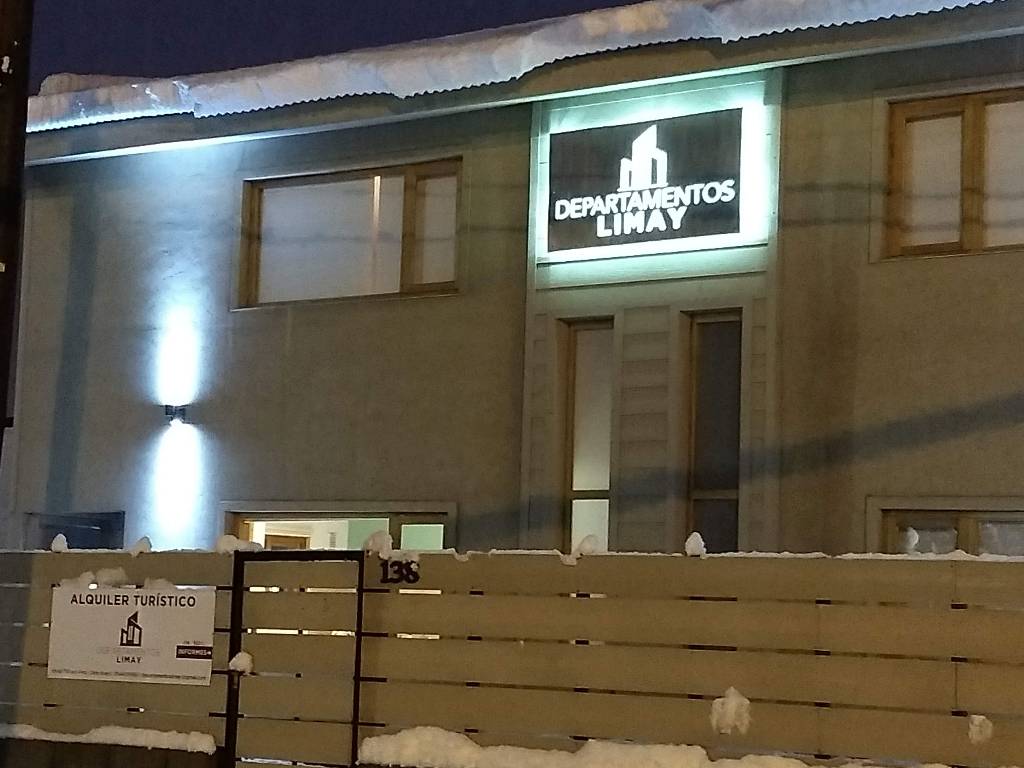 Departamentos Limay at night